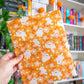 Orange Floral Ghosts Book Sleeve